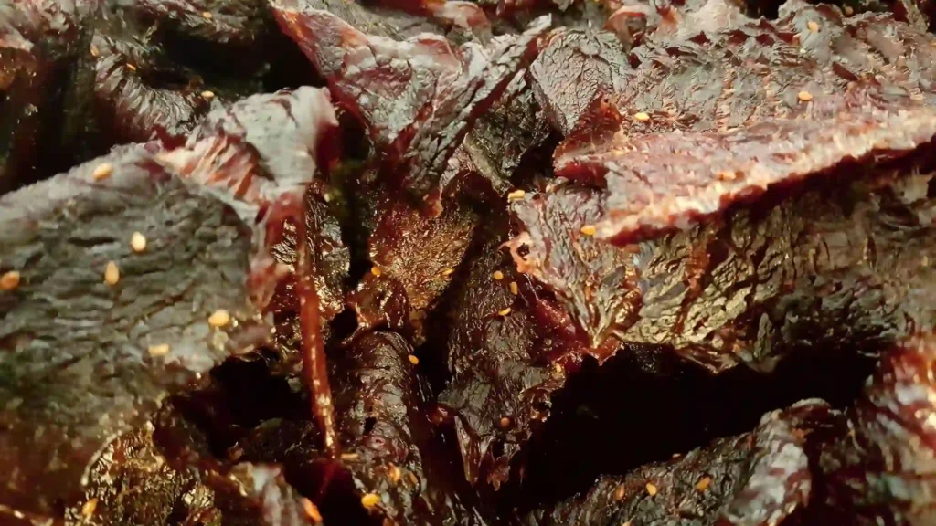 A close up picture of a beef jerky