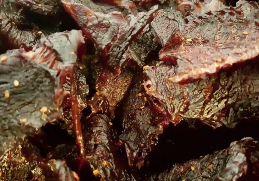 A close up picture of a beef jerky